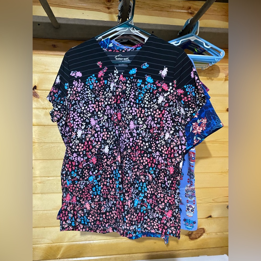 Butter soft scrub top black with different flowers